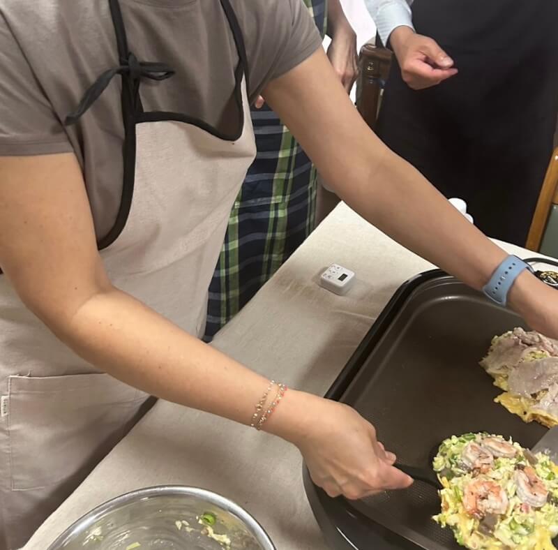 Make Okonomiyaki and Fried noodles on a hot plate.