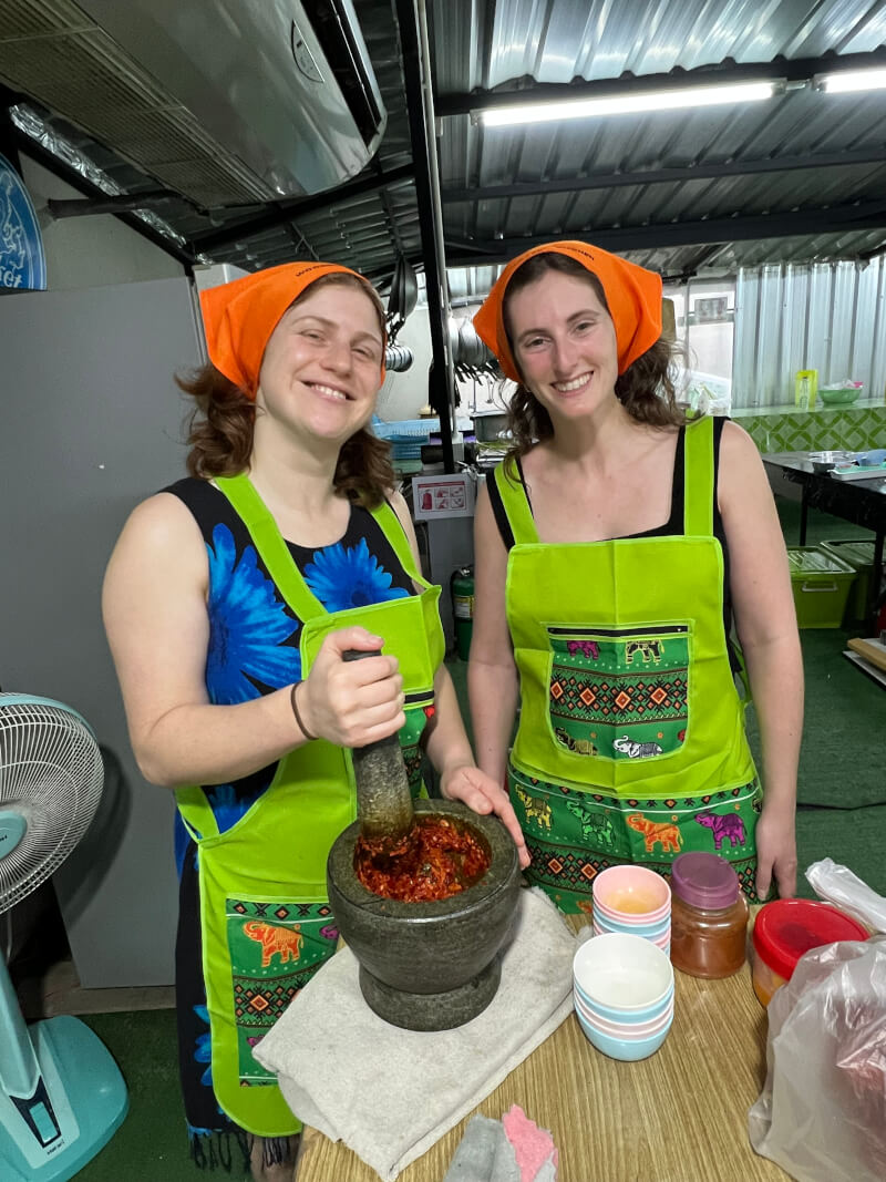 Chef Woody brings over 8 years of real Thai cooking experience, combining family traditions with a fun, hands-on teaching style. His classes feel less like school, more like cooking with friends — warm, personal, and unforgettable.