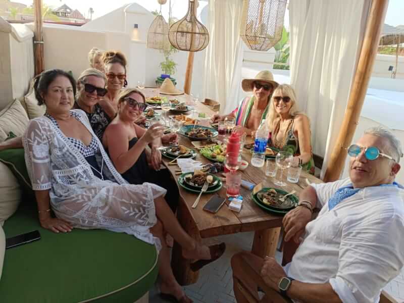 The guests are taking their dinner on a riad terrace
