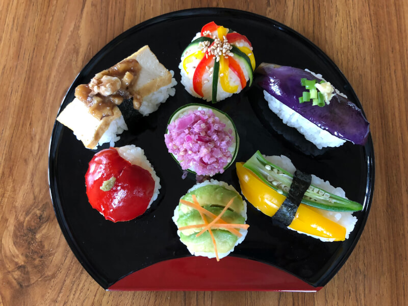Vegan sushi cooking in kimono