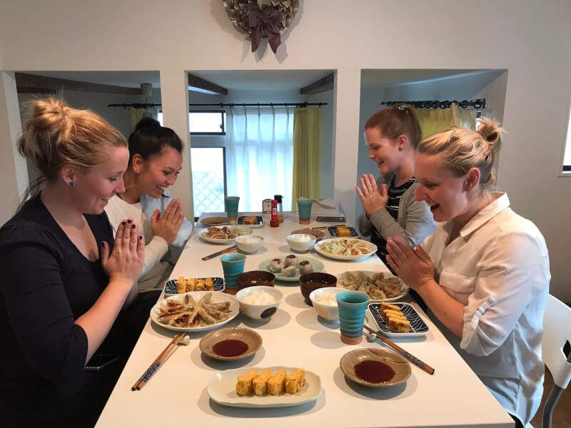 Home-style Gyoza from scratch , Strawberry Daifuku(Sweet Mochi) , Japanese rolled omelette and Local market tour in a private class