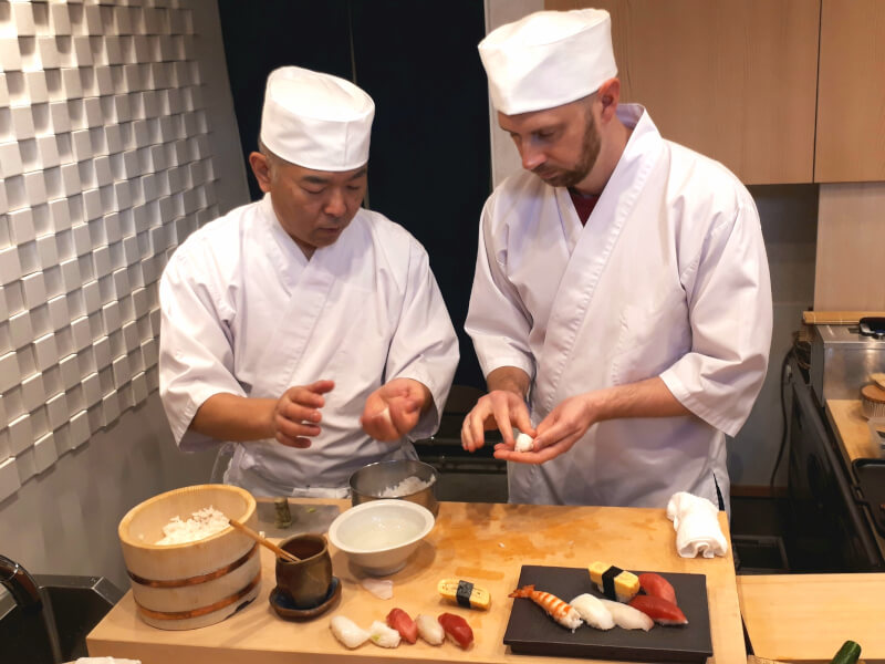 Sushi-making class taught by a professional master sushi chef and  sake-tasting tour